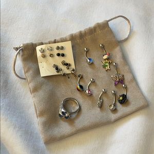 Various earings, belly rings and rings